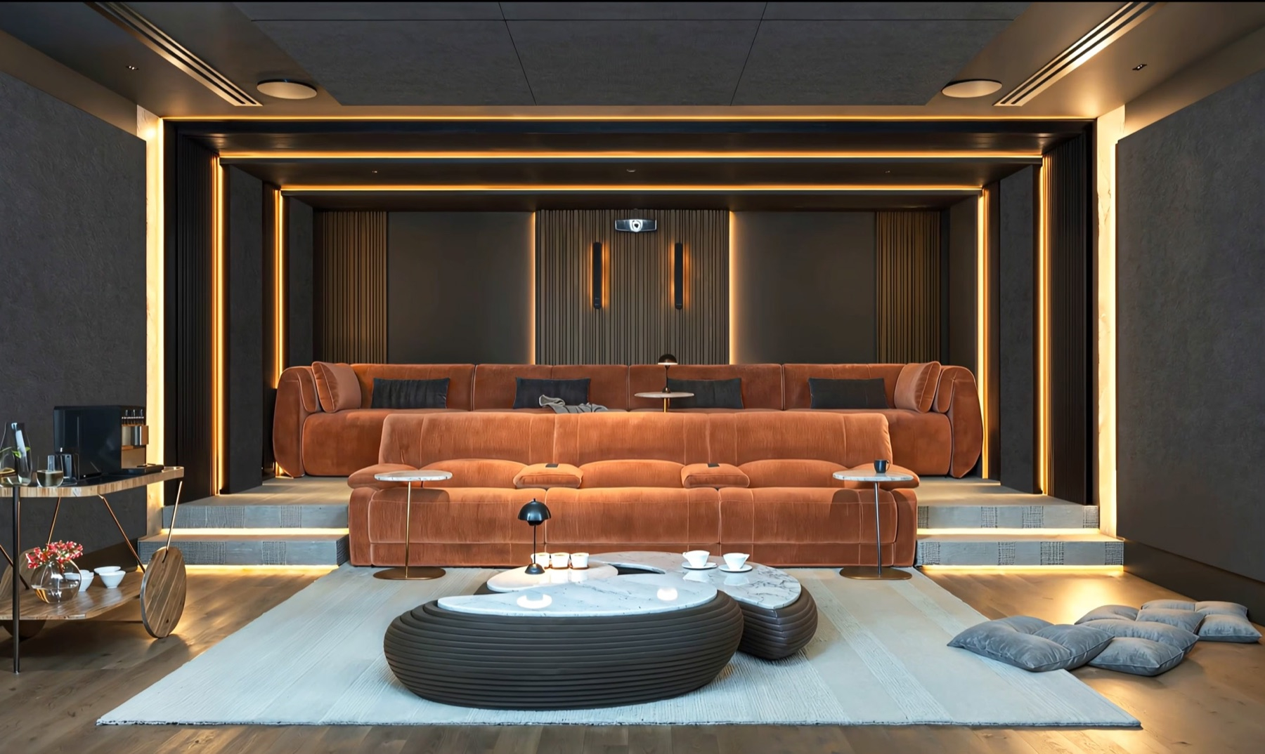 Salle home cinéma Artnovion ChromaX, fauteuils velours orange et grand écran